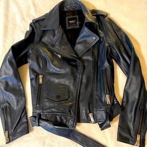 Barney’s real leather jacket. Dark navy blue! Fits like XS!